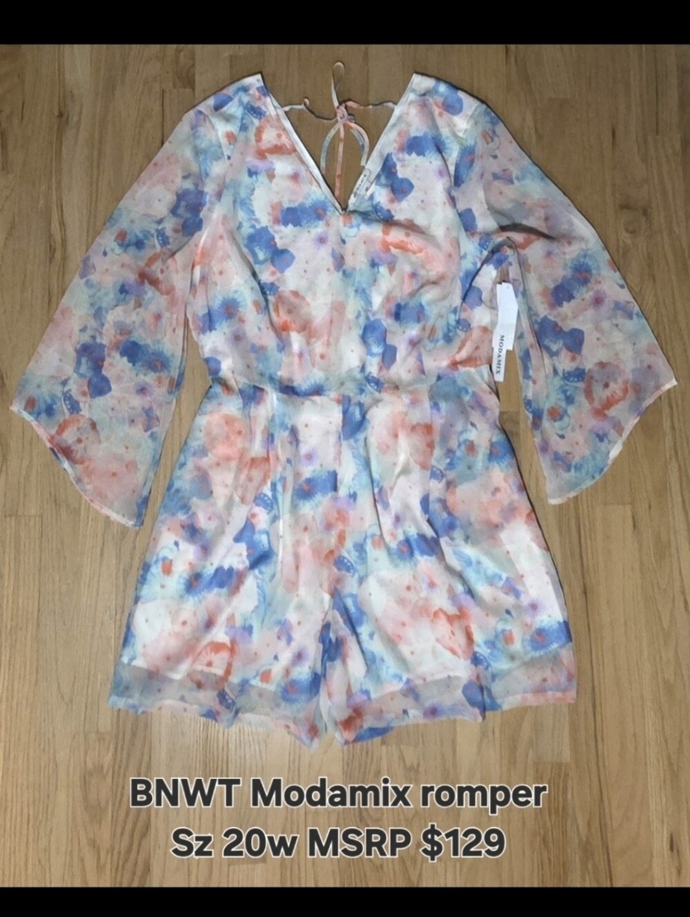 Brand New with tags Modamix romper, size 20W, originally $129